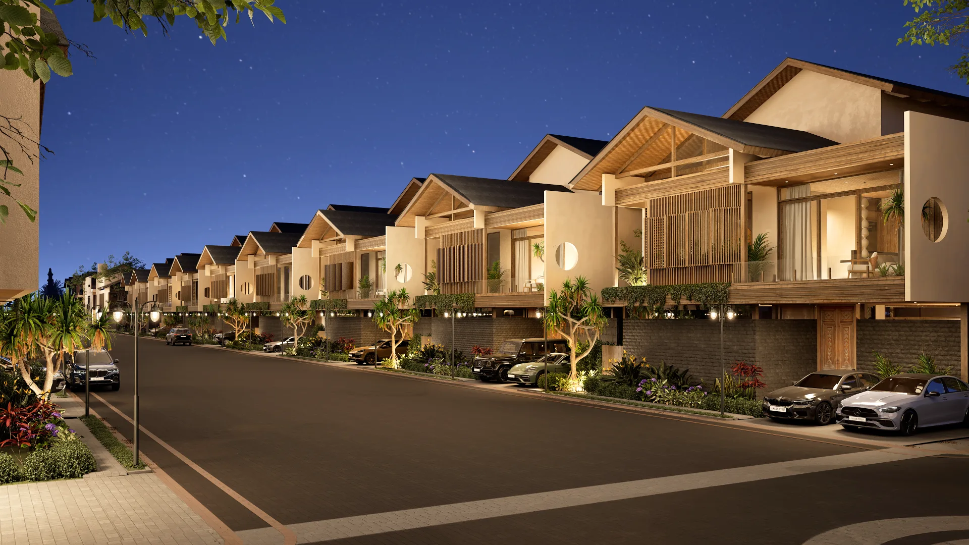 AWAN — five-bedroom Balinese-inspired signature villa, evening render with lit pavilions and timber-veined facade